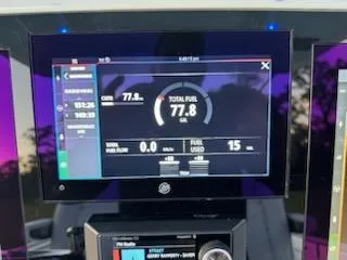 Slide: The Image of Crevalle 33 CSF 2024 dashboard display showing fuel data and system information. - 36