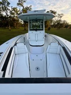 Slide: The Image of 2024 Crevalle 33 CSF boat with spacious seating and sleek design. - 4