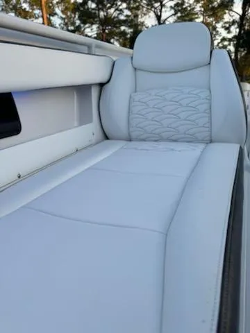 Slide: The Image of 2024 Crevalle 33 CSF boat seat with white upholstery and elegant stitching. - 9