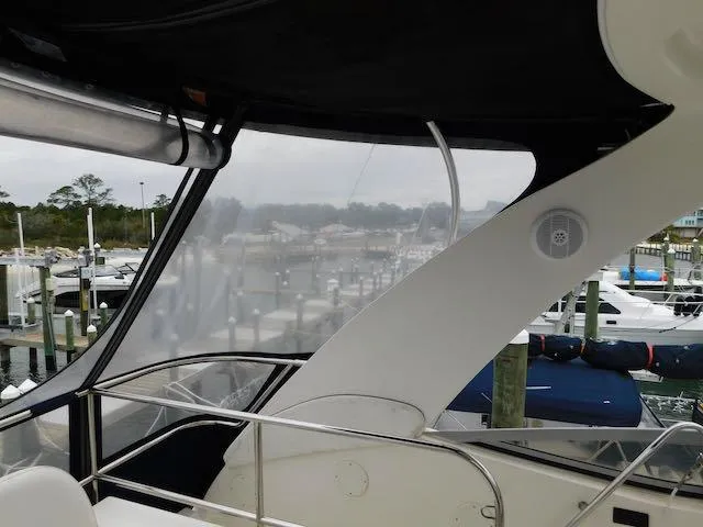 Slide: The Image of 2007 Sea Ray 36 Sedan Bridge interior view at marina. - 16