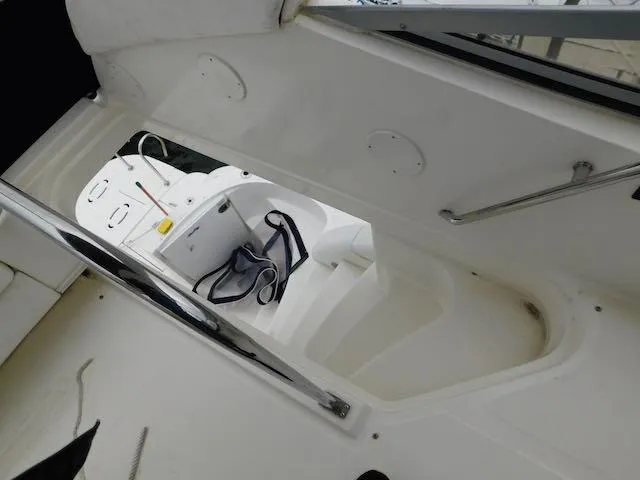 Slide: The Image of 2007 Sea Ray 36 Sedan Bridge interior with white seating and railing. - 17