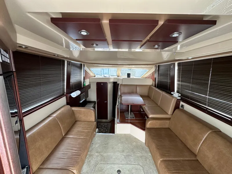 Slide: The Image of Luxurious interior of 2007 Sea Ray 36 Sedan Bridge yacht with leather seating. - 29