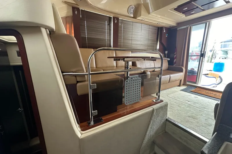 Slide: The Image of Interior of 2007 Sea Ray 36 Sedan Bridge with leather seating and modern design. - 33