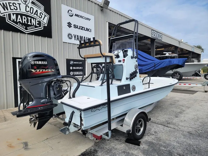 Slide: The Image of 2025 Shallow Sport 18 Sport boat with Yamaha engine at West Coast Marine. - 12