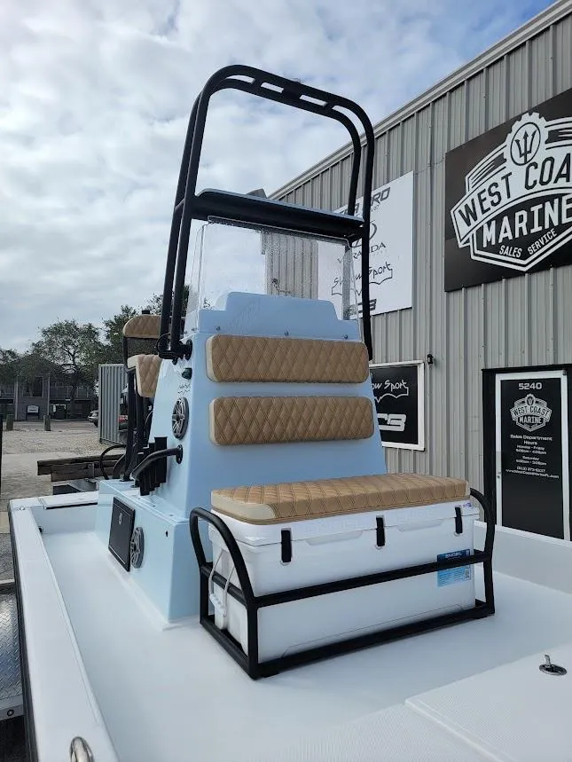 Slide: The Image of 2025 Shallow Sport 18 Sport boat at West Coast Marine dealership. - 14