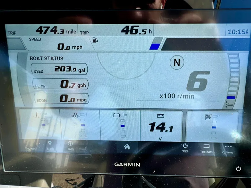 Slide: The Image of Garmin display showing 2023 Regal 26 XO boat stats: 474.3 miles, 203.9 gallons used. - 39