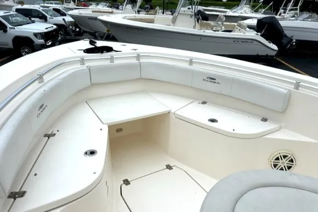 Slide: The Image of 2020 Cobia 237 Center Console boat with spacious seating and storage. - 5
