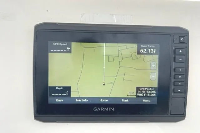 Slide: The Image of Garmin GPS display on 2020 Cobia 237 Center Console showing navigation and water temperature. - 7