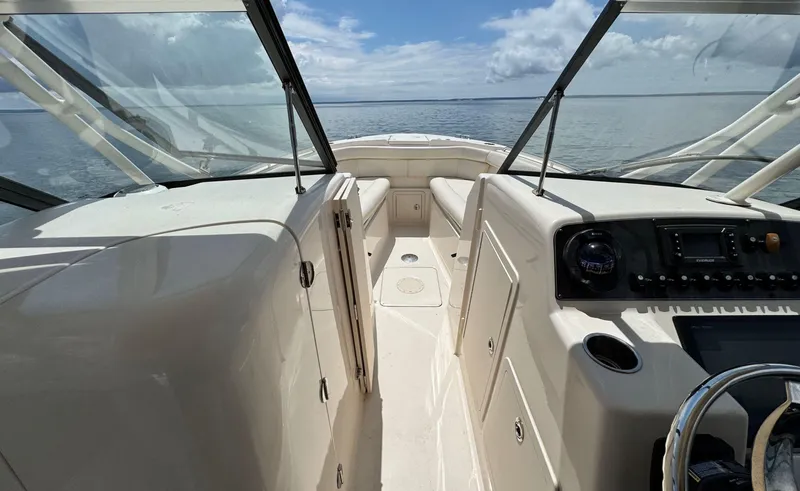 Slide: The Image of 2016 Grady-White Freedom 285 boat interior with ocean view and clear skies. - 18