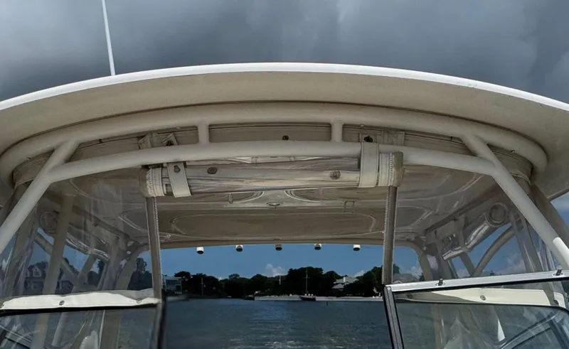 Slide: The Image of 2016 Grady-White Freedom 285 boat interior with stormy sky background. - 31
