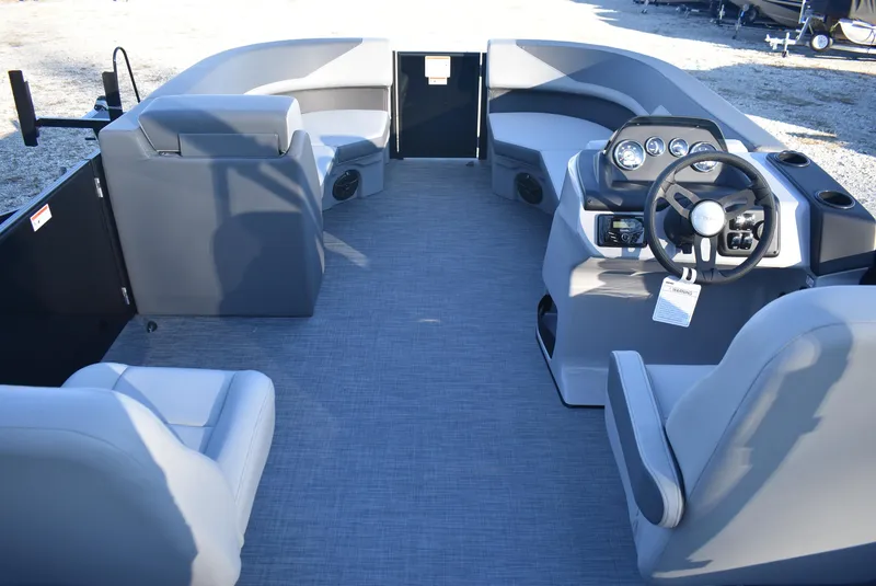 Slide: The Image of 2025 Lowe LS 190 boat interior with steering console and seating. - 3