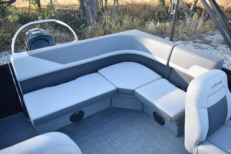 Slide: The Image of 2025 Lowe LS 190 boat interior with gray seating and modern design. - 7