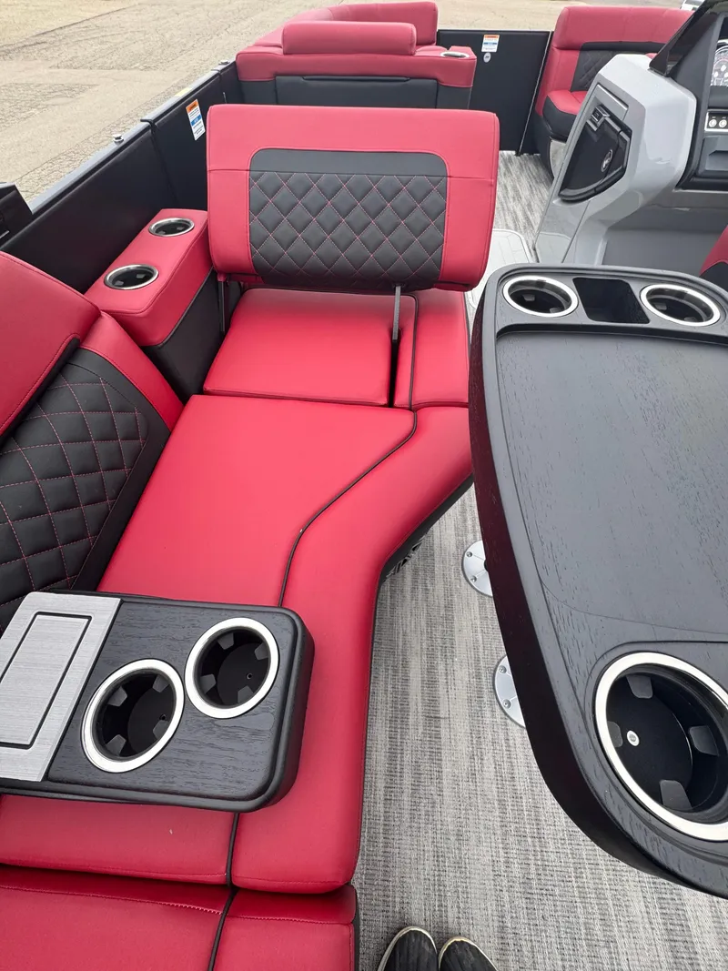 Slide: The Image of Luxurious red and black seating on 2025 Godfrey AQUAPATIO 255SFL boat. - 12