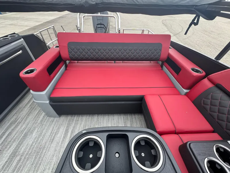 Slide: The Image of Luxurious red and black seating on 2025 Godfrey AQUAPATIO 255SFL boat. - 19