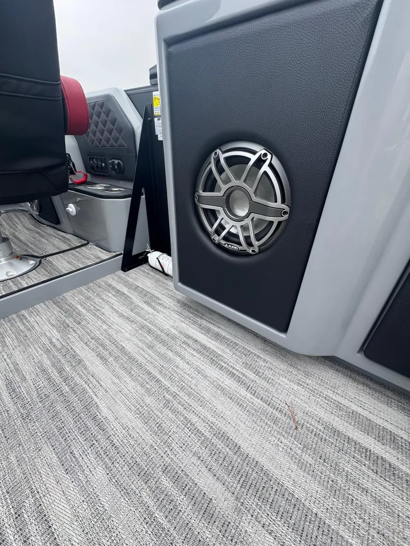 Slide: The Image of 2025 Godfrey AQUAPATIO 255SFL interior with speaker and modern design elements. - 21