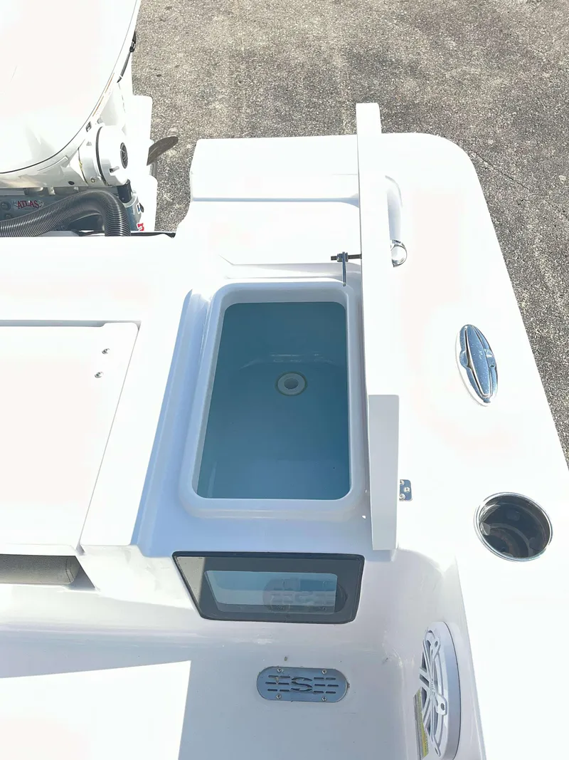 Slide: The Image of 2025 Sportsman 247 MASTERS boat deck with livewell and storage compartments. - 19