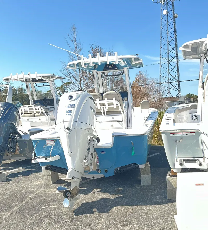 Slide: The Image of 2025 Sportsman 247 MASTERS boat with Yamaha V6 engine, displayed outdoors. - 3