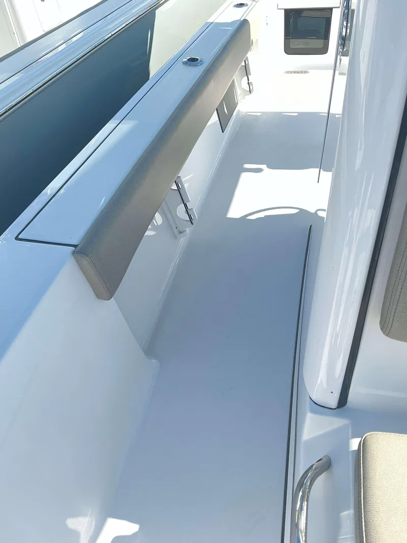 Slide: The Image of 2025 Sportsman 247 MASTERS boat interior with sleek seating and modern design. - 9