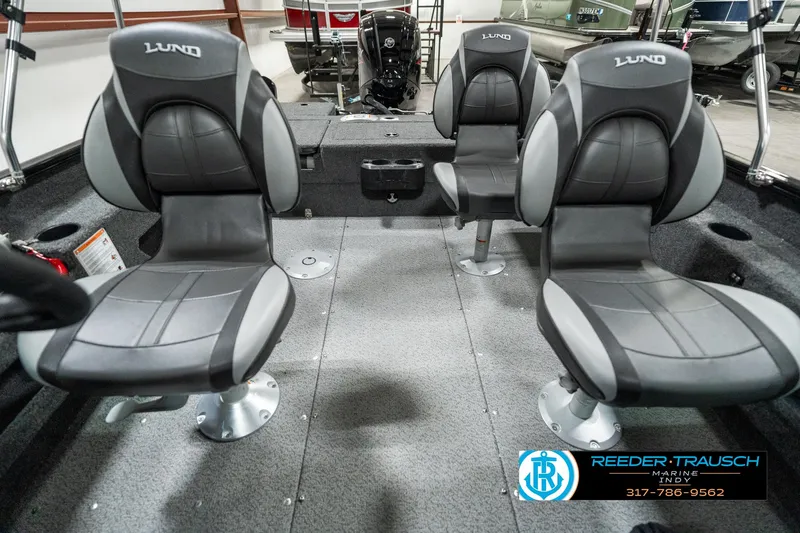 Slide: The Image of Interior of 2025 Lund 1775 Adventure Sport boat with four cushioned seats. - 13