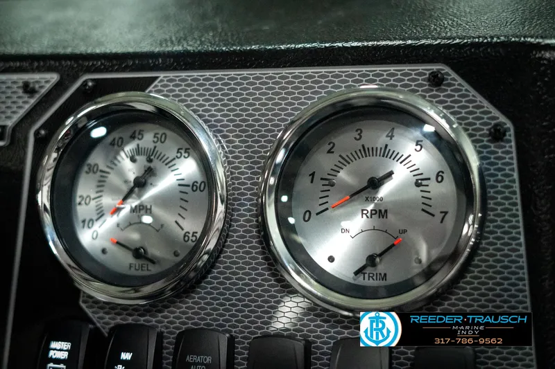 Slide: The Image of 2025 Lund 1775 Adventure Sport dashboard with speedometer and RPM gauges. - 31