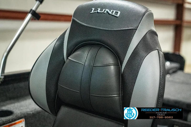 Slide: The Image of 2025 Lund 1775 Adventure Sport boat seat, black and gray design, Reeder-Trausch Marine logo. - 34
