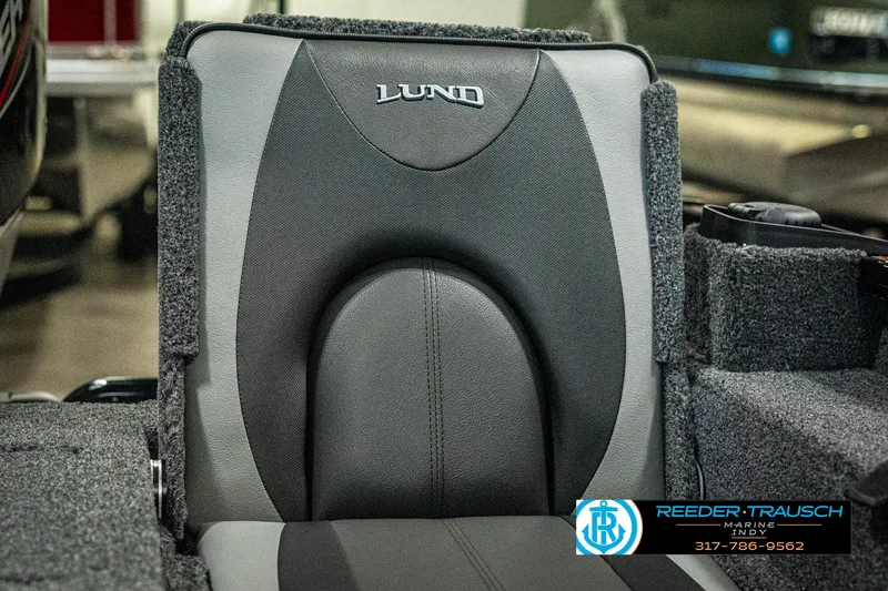 Slide: The Image of 2025 Lund 1775 Adventure Sport boat seat, gray upholstery, Reeder-Trausch Marine logo. - 36