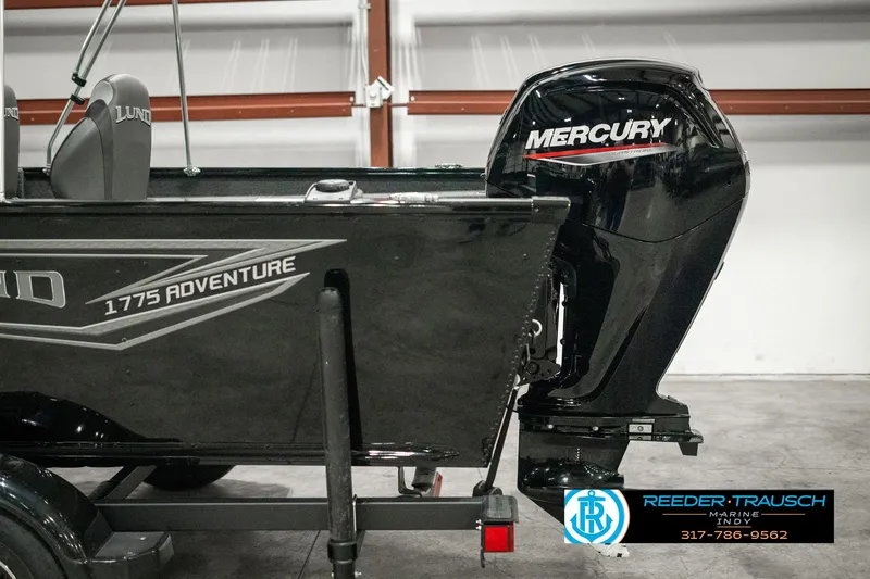 Slide: The Image of 2025 Lund 1775 Adventure Sport boat with Mercury engine in showroom. - 40