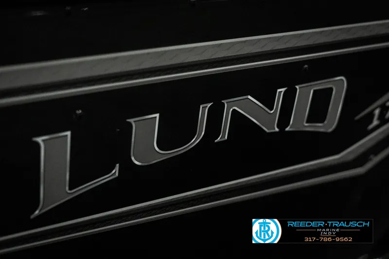 Slide: The Image of Close-up of 2025 Lund 1775 Adventure Sport logo on a dark background. - 45