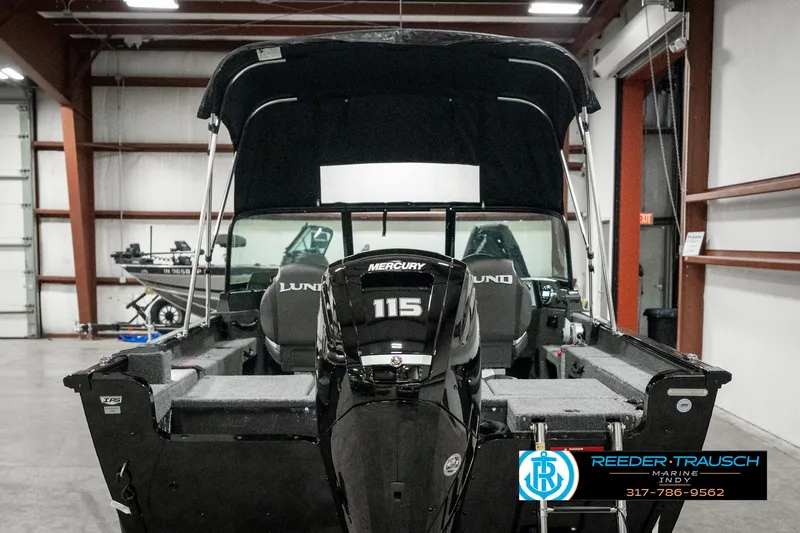 Slide: The Image of 2025 Lund 1775 Adventure Sport boat with Mercury 115 engine in showroom. - 6