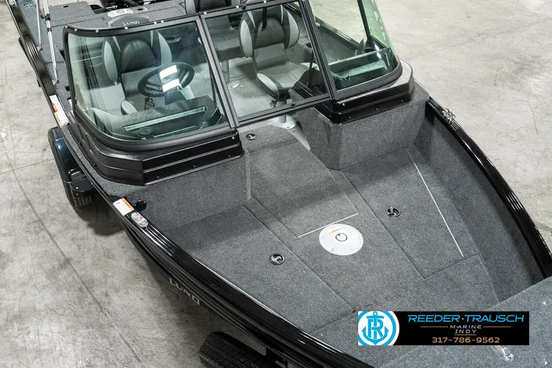 Slide: The Image of 2025 Lund 1775 Adventure Sport boat with spacious interior and sleek design. - 9