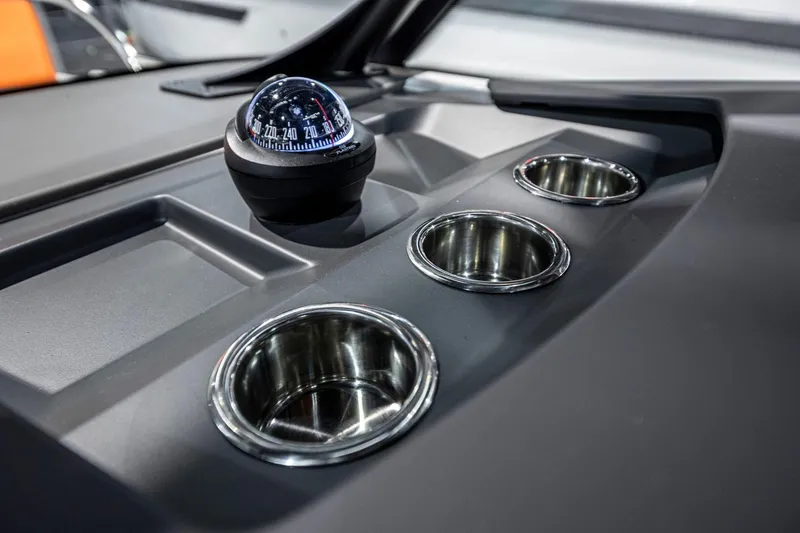 Slide: The Image of Nimbus Tender 8 (2025) dashboard with compass and cup holders. - 8