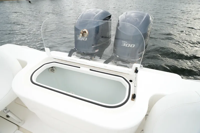Slide: The Image of 2012 Invincible 33 Open Fisherman with twin Yamaha 300 engines on water. - 25