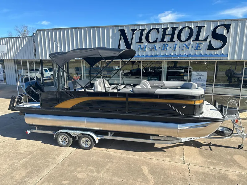 Slide: The Image of 2025 Bennington 23 SSB pontoon boat at Nichols Marine dealership. - 1