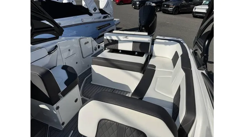 Slide: The Image of 2020 Monterey M65 boat interior with sleek seating and modern design. - 2