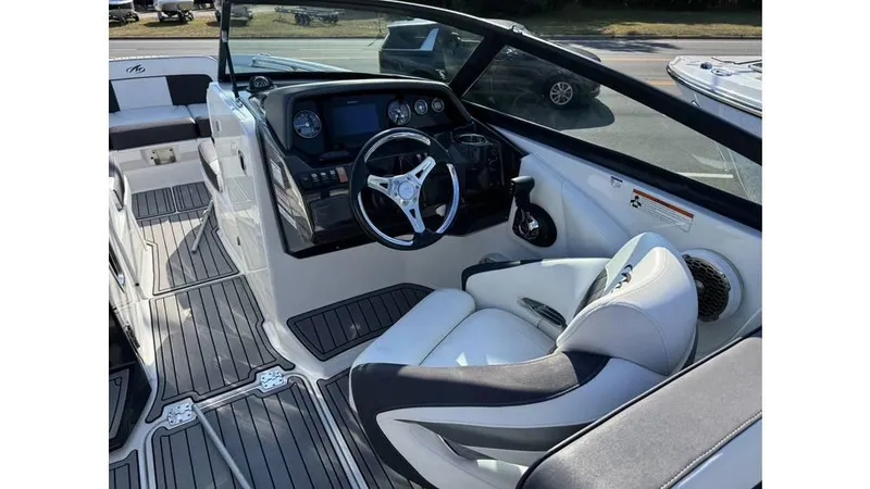 Slide: The Image of 2020 Monterey M65 boat interior with sleek dashboard and comfortable seating. - 4