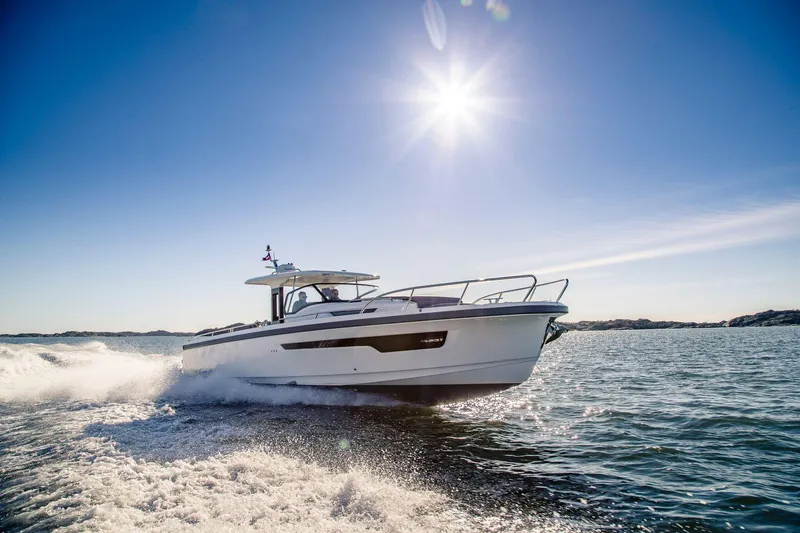 Slide: The Image of Nimbus Tender 11 boat cruising on sunny waters, 2025 model. - 21