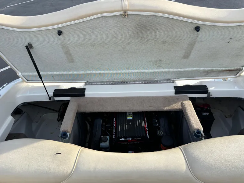 Slide: The Image of 1999 Sea Ray 190 Bow Rider engine compartment with open cover. - 8