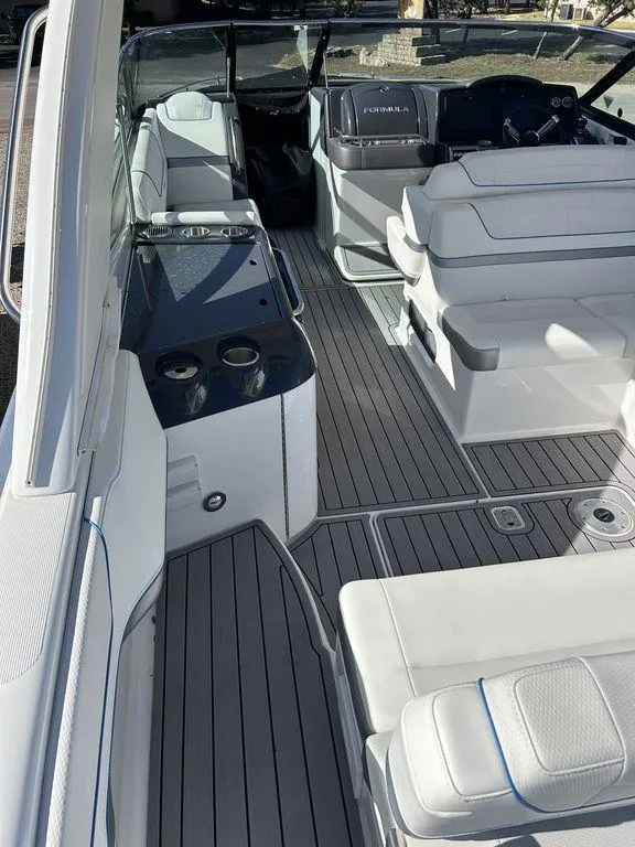 Slide: The Image of 2023 Formula 350 Crossover Bowrider interior with sleek seating and modern design. - 14