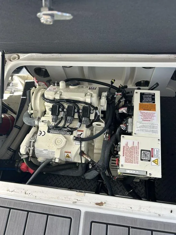 Slide: The Image of 2023 Formula 350 Crossover Bowrider engine compartment, showcasing detailed mechanical components. - 19