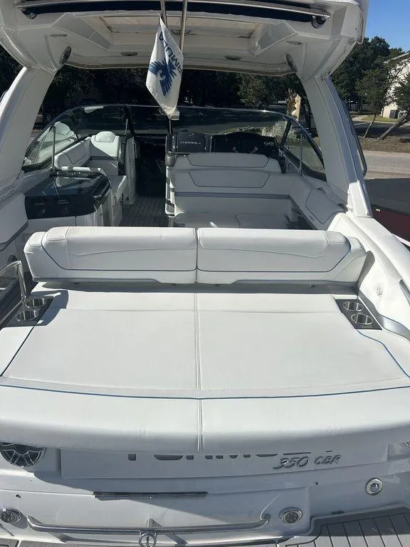 Slide: The Image of 2023 Formula 350 Crossover Bowrider with spacious seating and sleek design. - 4