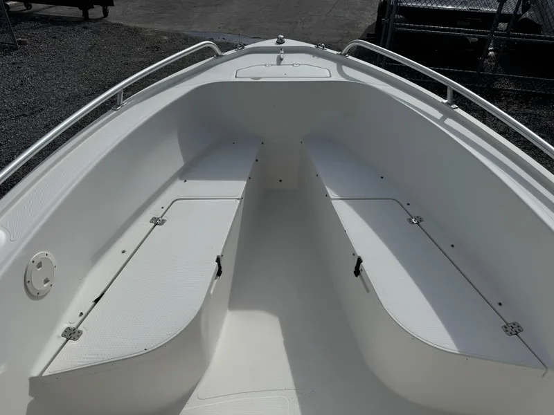 Slide: The Image of 2008 Mako 212 Center Console boat interior with storage compartments. - 10