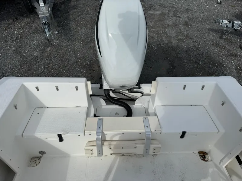 Slide: The Image of 2008 Mako 212 Center Console boat with outboard motor, viewed from above. - 15