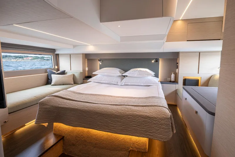 Slide: The Image of Luxurious interior of 2025 Nimbus 495 Flybridge yacht with elegant bedroom design. - 45