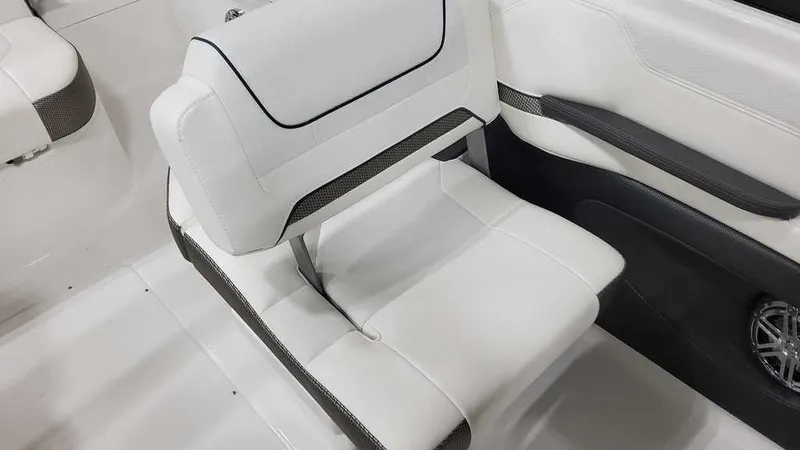 Slide: The Image of 2025 Formula 240 Bowrider interior with white seating and sleek design. - 17
