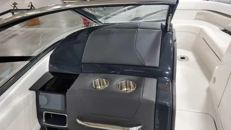 Slide: The Image of 2025 Formula 240 Bowrider interior with sleek seating and cup holders. - 21