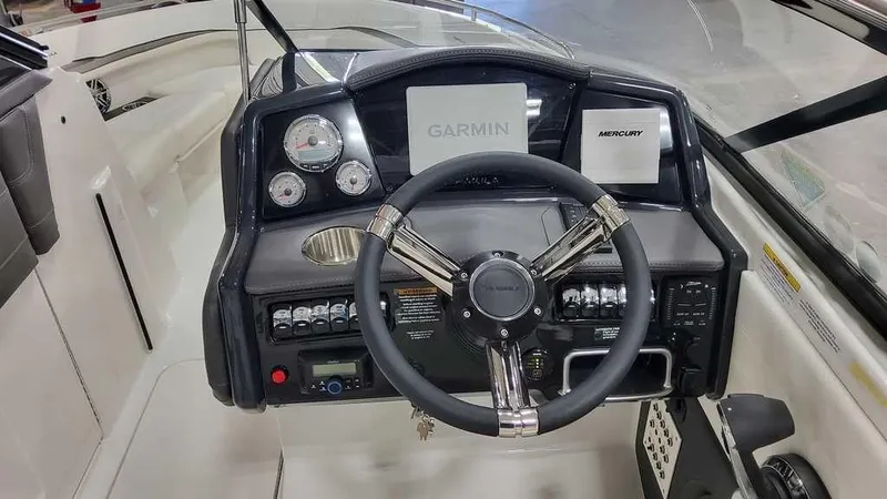 Slide: The Image of 2025 Formula 240 Bowrider dashboard with Garmin and Mercury displays. - 22