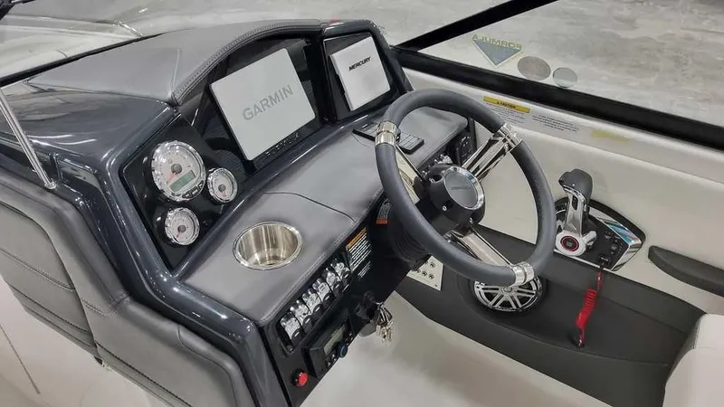 Slide: The Image of 2025 Formula 240 Bowrider dashboard with Garmin navigation and modern controls. - 23