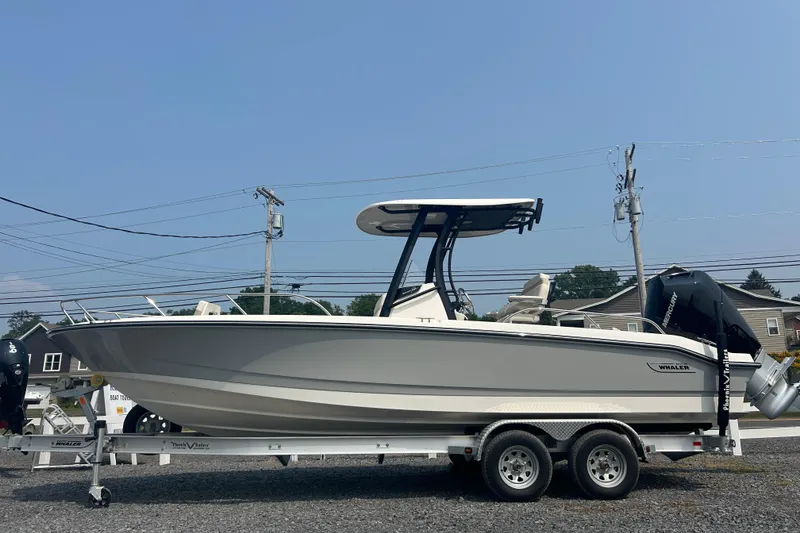 The Image of 2025 Boston Whaler 250 Dauntless boat on trailer in indoor storage. - 0