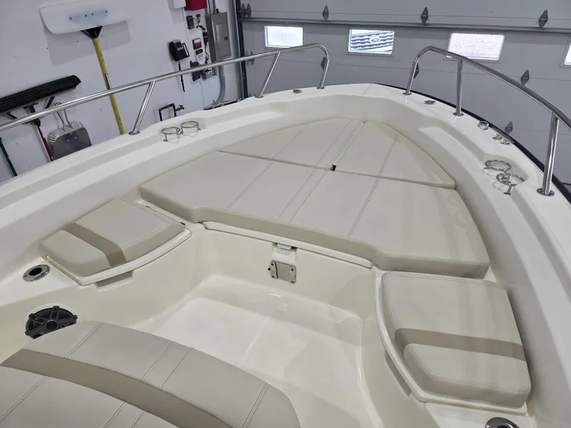 Slide: The Image of 2025 Boston Whaler 250 Dauntless helm with Simrad electronics and Mercury controls. - 21