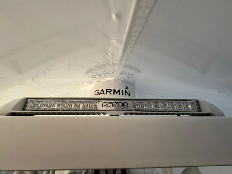 Slide: The Image of Garmin and Razor light on 2022 Sailfish 242 CC boat. - 10